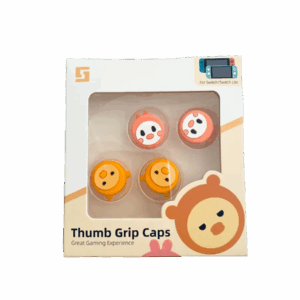 A product box containing four circular thumb grip caps for a Nintendo Switch. Two caps are orange and two are yellow, each featuring a cute, white "kawaii" animal face with pink cheeks. The packaging is white with the text "Thumb Grip Caps" and "Great Gaming Experience."