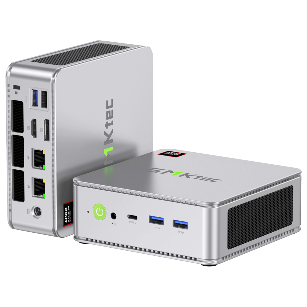 GMKTec NucBox K8 1 The image depicts the GMKTEC NUBOX K8 Mini PC in a stylish silver finish, showcasing its sleek and modern design. The silver color adds a touch of elegance to the device. The GMKTEC logo is subtly displayed on the top surface. Overall, the image highlights the sleek and minimalist aesthetic of the GMKTEC NUBOX K8 Mini PC in silver.