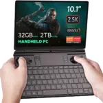 The GPD Win Max 2 (2024) is shown running The Witcher game on its display. The device features impressive specifications, including up to 64GB of RAM, up to 4TB SSD NVMe storage, and a Ryzen 7 8840U CPU, highlighting its capability to handle demanding games with ease.