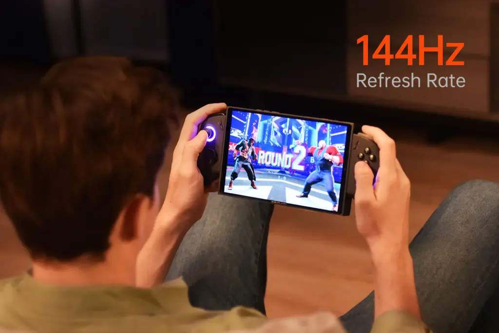A person playing a fighting game on the ONEXPLAYER X1 Mini in handheld mode, showcasing the device's ergonomic controls and smooth gameplay supported by a 144Hz refresh rate.