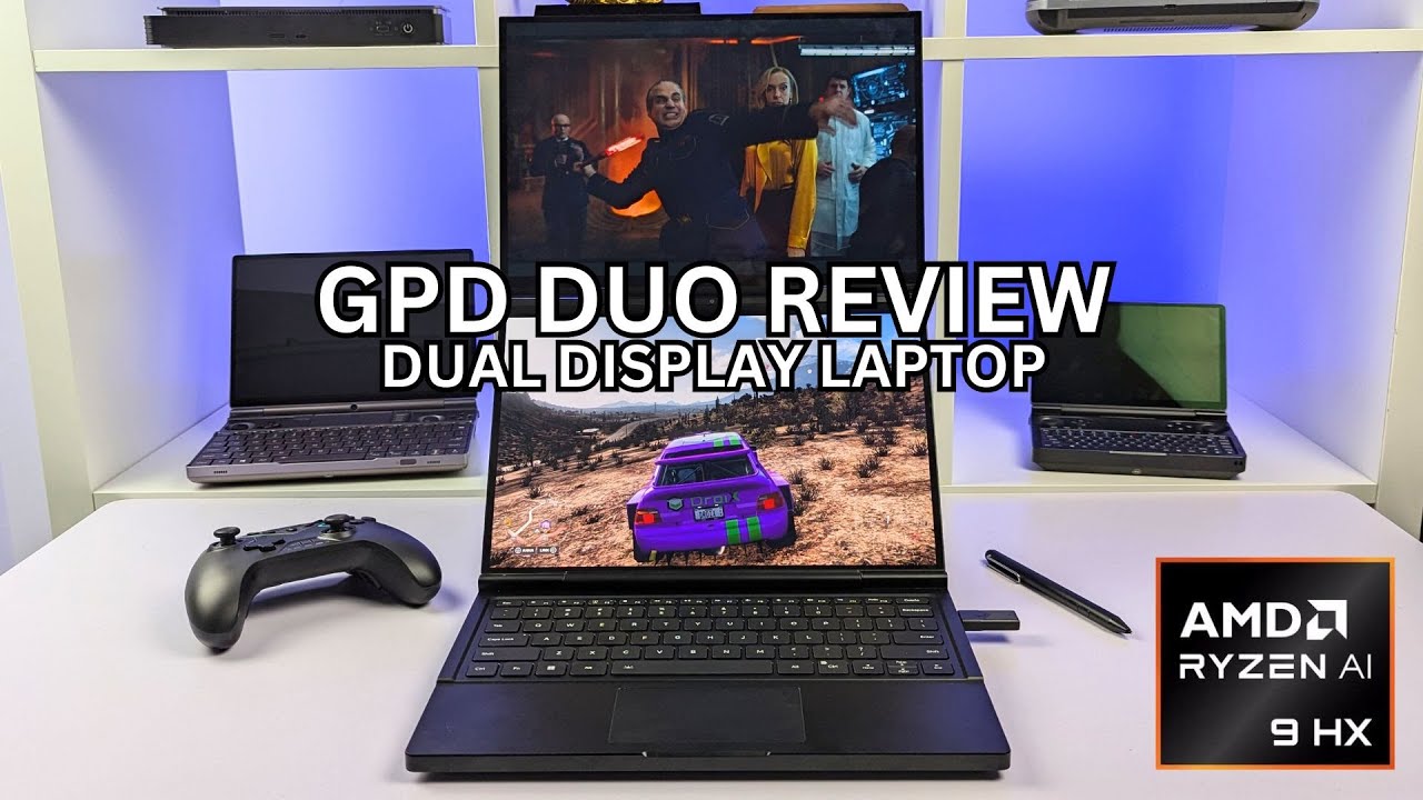 This image shows a dual-display laptop titled "GPD DUO REVIEW." The laptop features two screens, one on top of the other, with the upper screen displaying a scene from a movie or TV show, while the lower screen shows a racing video game. The laptop has a keyboard at the bottom, and there is a game controller and a pen resting on the table next to it. The background shows a shelf with other laptops and tech gadgets. The AMD Ryzen 9 HX processor logo is displayed in the bottom right corner of the image.