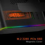Close-up of the ONEXGPU device showcasing its magnetic cover for an M.2 2280 PCIe SSD, featuring a highlighted 4TB SSD slot in orange with subtle RGB lighting along the device edges