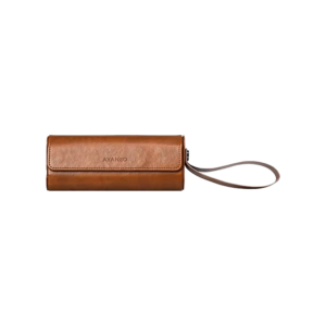 AYANEO Micro Protective Leather Case in brown, featuring a compact, cylindrical design with a fold-over flap secured by a magnetic closure. The case has a wrist strap attached for easy carrying, and the 'AYANEO' logo is embossed on the front. Designed to provide stylish and durable protection for AYANEO Pocket Micro devices.