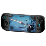 A black AYN Odin 2 Portal handheld gaming console displaying an action-packed RPG game. The screen shows a character using a fiery attack against enemies in a frozen landscape. The device has an ergonomic design with illuminated thumbsticks.