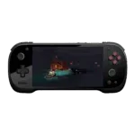 A front-on view of a black KONKR Pocket Fit handheld gaming console against a dark green background. The screen displays a video game scene featuring a small boat in a dark cave. The console has a D-pad and analog stick on the left, and red-colored face buttons and an analog stick on the right.
