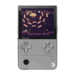 A front-on view of the AYANEO Pocket DMG handheld gaming console in a silver/grey color, set against a black background. The console has a vertical, Game Boy-inspired form factor with a large screen displaying a retro-style pixel art game featuring a cloud-like boss and orange projectiles. The controls include a prominent grey D-pad on the left, grey A, B, X, Y face buttons on the right, and a black analog stick positioned below the D-pad. The AYANEO POCKET DMG logo is visible below the screen.