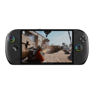 A sleek, black handheld gaming console, the ONEXPLAYER, is shown from a direct front-facing view against a solid white background. Key Visual Details: Screen: A large, vibrant display fills the center, showing a third-person shooter video game set in a dusty, industrial desert environment. A character in an orange suit is visible in the foreground. Controls: * Left Side: Features a circular joystick with a multi-colored RGB LED ring and a classic cross-shaped D-pad. Right Side: Features four action buttons (labeled X, Y, A, B), a second joystick with a matching RGB ring, and a dedicated "ONEX" button near the bottom. Design: The device has a rounded, ergonomic "pill" shape with a matte black finish. The "ONEXPLAYER" branding is subtly printed centered just below the screen.