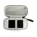 Open view of the MANGMI Air X Carrying Case on a white background, demonstrating a white handheld gaming console safely secured inside the light-gray plush bottom compartment using a central elastic security strap. The upper lid features a zippered mesh accessory pocket, with a "Device not included" disclaimer at the bottom.