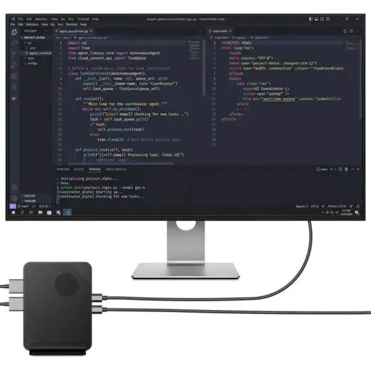 GPD BOX black textured mini PC with round vent, cabled to monitor showing Visual Studio Code
