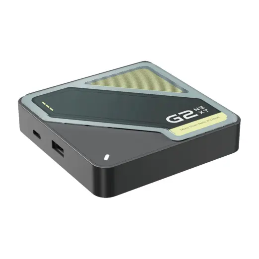 RockTek G2 Next Google TV box angled view, matte black body with glossy top, yellow striped detail and front ports