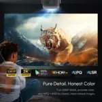 Child watching a crisp projection of a roaring lynx. Badges highlight 1080P, 2K support, 95% NTSC, HDR10+, and AI tech.