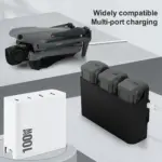 A multi-port 100W GaN charger simultaneously supplying power to a folded DJI Air 3 drone and a three-slot drone battery charging hub